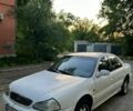 Белый Киа Кларус, объемом двигателя 2 л и пробегом 110 тыс. км за 1500 $, фото 1 на Automoto.ua