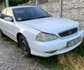 Белый Киа Кларус, объемом двигателя 2 л и пробегом 250 тыс. км за 1400 $, фото 1 на Automoto.ua