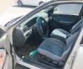 Білий Кіа Кларус, об'ємом двигуна 2 л та пробігом 380 тис. км за 1014 $, фото 5 на Automoto.ua