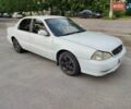 Белый Киа Кларус, объемом двигателя 2 л и пробегом 338 тыс. км за 1900 $, фото 1 на Automoto.ua
