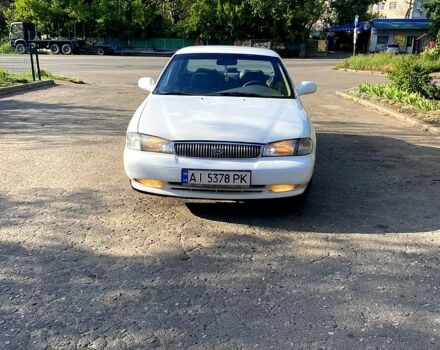 Белый Киа Кларус, объемом двигателя 2 л и пробегом 200 тыс. км за 1850 $, фото 1 на Automoto.ua