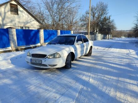 Белый Киа Кларус, объемом двигателя 1.8 л и пробегом 300 тыс. км за 1700 $, фото 1 на Automoto.ua