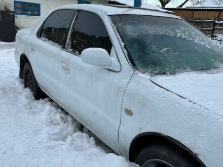 Білий Кіа Кларус, об'ємом двигуна 1.8 л та пробігом 666 тис. км за 737 $, фото 1 на Automoto.ua