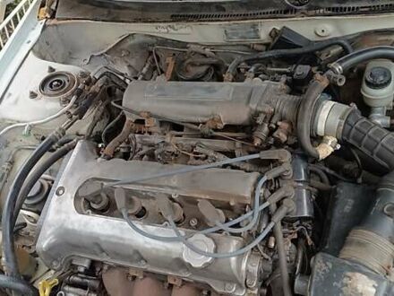 Белый Киа Кларус, объемом двигателя 1.8 л и пробегом 240 тыс. км за 427 $, фото 1 на Automoto.ua