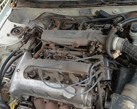 Белый Киа Кларус, объемом двигателя 1.8 л и пробегом 240 тыс. км за 427 $, фото 1 на Automoto.ua