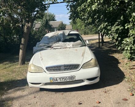 Білий Кіа Кларус, об'ємом двигуна 2 л та пробігом 190 тис. км за 671 $, фото 1 на Automoto.ua