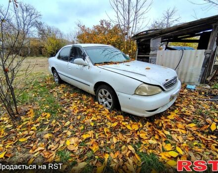 Белый Киа Кларус, объемом двигателя 2 л и пробегом 170 тыс. км за 1100 $, фото 1 на Automoto.ua