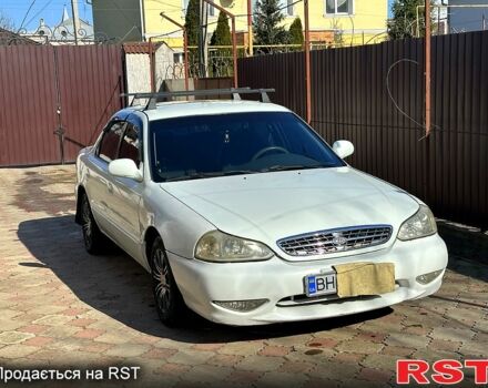 Белый Киа Кларус, объемом двигателя 1.6 л и пробегом 250 тыс. км за 2200 $, фото 1 на Automoto.ua