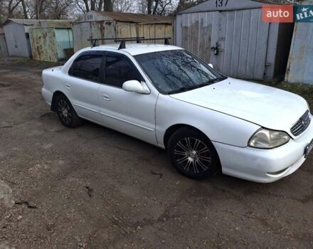 Белый Киа Кларус, объемом двигателя 2 л и пробегом 285 тыс. км за 2100 $, фото 1 на Automoto.ua