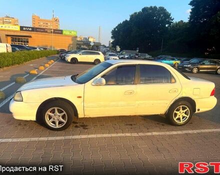 Белый Киа Кларус, объемом двигателя 2 л и пробегом 200 тыс. км за 800 $, фото 1 на Automoto.ua