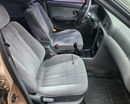 Бежевый Киа Кларус, объемом двигателя 2 л и пробегом 292 тыс. км за 2200 $, фото 10 на Automoto.ua