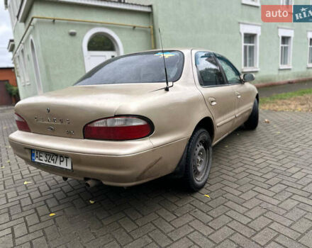 Бежевый Киа Кларус, объемом двигателя 2 л и пробегом 300 тыс. км за 1300 $, фото 2 на Automoto.ua