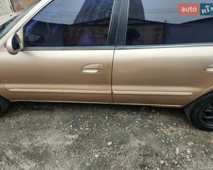 Бежевый Киа Кларус, объемом двигателя 2 л и пробегом 292 тыс. км за 2200 $, фото 6 на Automoto.ua