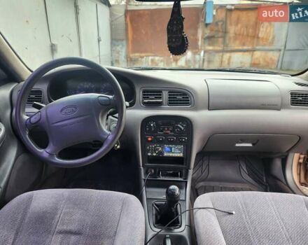 Бежевый Киа Кларус, объемом двигателя 2 л и пробегом 292 тыс. км за 2200 $, фото 12 на Automoto.ua