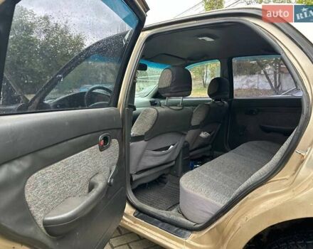 Бежевый Киа Кларус, объемом двигателя 2 л и пробегом 300 тыс. км за 1499 $, фото 5 на Automoto.ua