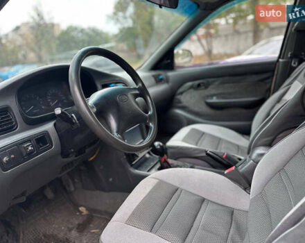 Бежевый Киа Кларус, объемом двигателя 2 л и пробегом 300 тыс. км за 1300 $, фото 4 на Automoto.ua