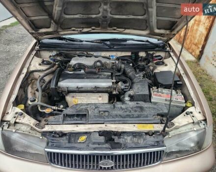 Бежевый Киа Кларус, объемом двигателя 2 л и пробегом 292 тыс. км за 2200 $, фото 9 на Automoto.ua