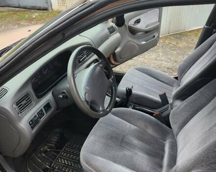 Бежевый Киа Кларус, объемом двигателя 2 л и пробегом 292 тыс. км за 2200 $, фото 11 на Automoto.ua