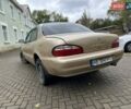 Бежевый Киа Кларус, объемом двигателя 2 л и пробегом 300 тыс. км за 1500 $, фото 3 на Automoto.ua