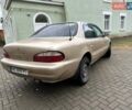 Бежевый Киа Кларус, объемом двигателя 2 л и пробегом 300 тыс. км за 1500 $, фото 2 на Automoto.ua
