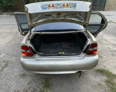 Бежевий Кіа Кларус, об'ємом двигуна 2 л та пробігом 327 тис. км за 2000 $, фото 7 на Automoto.ua