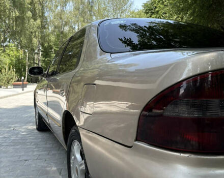 Бежевый Киа Кларус, объемом двигателя 2 л и пробегом 239 тыс. км за 1999 $, фото 18 на Automoto.ua