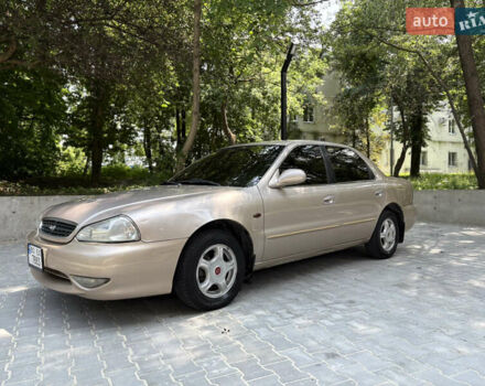 Бежевый Киа Кларус, объемом двигателя 2 л и пробегом 239 тыс. км за 1999 $, фото 14 на Automoto.ua