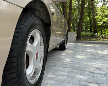 Бежевый Киа Кларус, объемом двигателя 2 л и пробегом 239 тыс. км за 1999 $, фото 9 на Automoto.ua