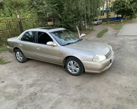 Бежевий Кіа Кларус, об'ємом двигуна 2 л та пробігом 327 тис. км за 2000 $, фото 3 на Automoto.ua