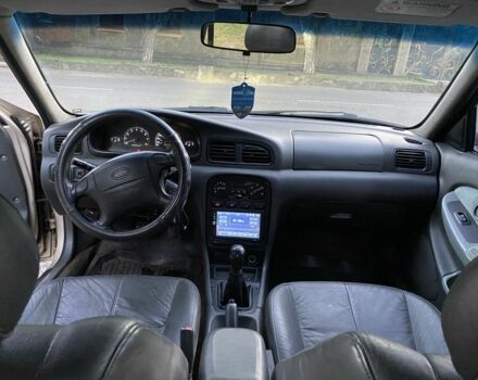 Бежевий Кіа Кларус, об'ємом двигуна 2 л та пробігом 327 тис. км за 2000 $, фото 1 на Automoto.ua