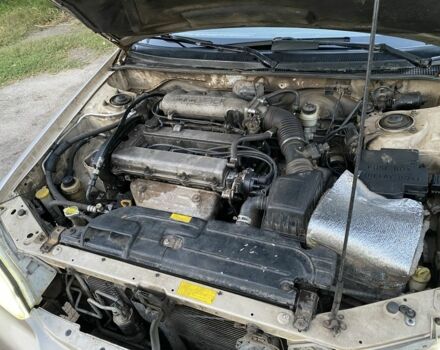 Бежевий Кіа Кларус, об'ємом двигуна 2 л та пробігом 327 тис. км за 2000 $, фото 4 на Automoto.ua