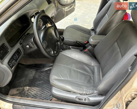 Бежевый Киа Кларус, объемом двигателя 2 л и пробегом 239 тыс. км за 1999 $, фото 26 на Automoto.ua