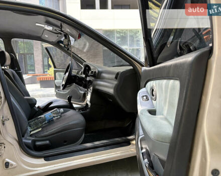 Бежевый Киа Кларус, объемом двигателя 2 л и пробегом 239 тыс. км за 1999 $, фото 22 на Automoto.ua