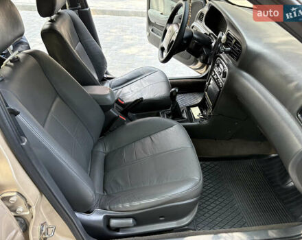 Бежевый Киа Кларус, объемом двигателя 2 л и пробегом 239 тыс. км за 1999 $, фото 27 на Automoto.ua