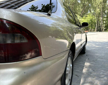 Бежевый Киа Кларус, объемом двигателя 2 л и пробегом 239 тыс. км за 1999 $, фото 11 на Automoto.ua