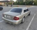 Бежевий Кіа Кларус, об'ємом двигуна 2 л та пробігом 360 тис. км за 897 $, фото 1 на Automoto.ua