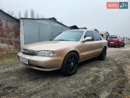 Бежевый Киа Кларус, объемом двигателя 2 л и пробегом 292 тыс. км за 2200 $, фото 1 на Automoto.ua