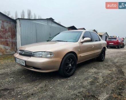 Бежевый Киа Кларус, объемом двигателя 2 л и пробегом 292 тыс. км за 2200 $, фото 1 на Automoto.ua