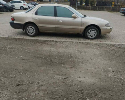 Бежевий Кіа Кларус, об'ємом двигуна 2 л та пробігом 250 тис. км за 1700 $, фото 1 на Automoto.ua