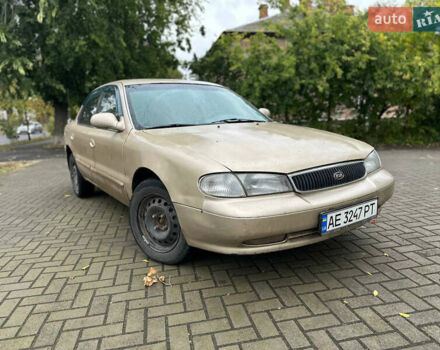 Бежевый Киа Кларус, объемом двигателя 2 л и пробегом 300 тыс. км за 1300 $, фото 1 на Automoto.ua