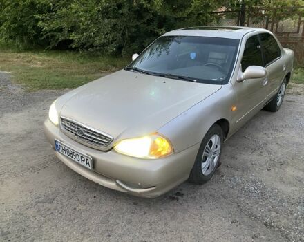 Бежевий Кіа Кларус, об'ємом двигуна 2 л та пробігом 327 тис. км за 2425 $, фото 1 на Automoto.ua
