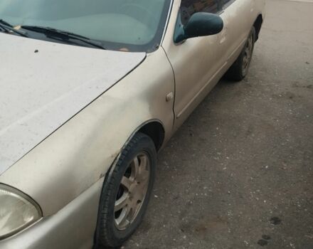 Бежевий Кіа Кларус, об'ємом двигуна 2 л та пробігом 360 тис. км за 1000 $, фото 1 на Automoto.ua