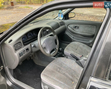 Чорний Кіа Кларус, об'ємом двигуна 2 л та пробігом 493 тис. км за 1850 $, фото 4 на Automoto.ua