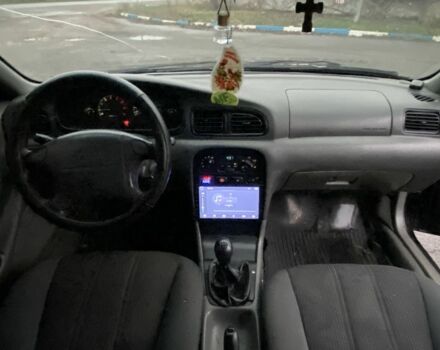 Чорний Кіа Кларус, об'ємом двигуна 2 л та пробігом 300 тис. км за 1600 $, фото 11 на Automoto.ua