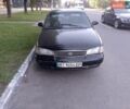 Чорний Кіа Кларус, об'ємом двигуна 2 л та пробігом 300 тис. км за 1254 $, фото 1 на Automoto.ua