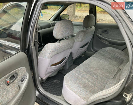 Чорний Кіа Кларус, об'ємом двигуна 2 л та пробігом 493 тис. км за 1850 $, фото 5 на Automoto.ua