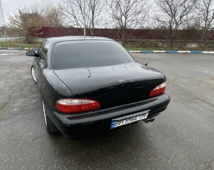 Чорний Кіа Кларус, об'ємом двигуна 2 л та пробігом 300 тис. км за 1600 $, фото 2 на Automoto.ua