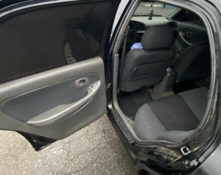 Чорний Кіа Кларус, об'ємом двигуна 2 л та пробігом 300 тис. км за 1600 $, фото 8 на Automoto.ua