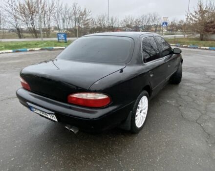 Чорний Кіа Кларус, об'ємом двигуна 2 л та пробігом 300 тис. км за 1600 $, фото 3 на Automoto.ua