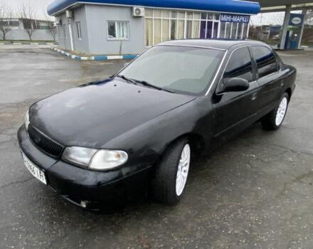 Чорний Кіа Кларус, об'ємом двигуна 2 л та пробігом 300 тис. км за 1600 $, фото 1 на Automoto.ua